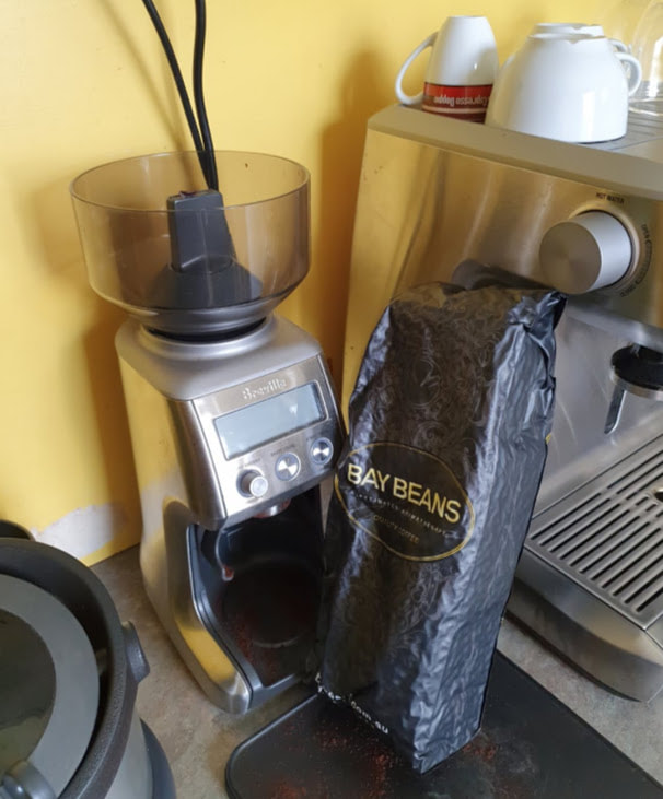 What is the best setting for my coffee grinder with fresh coffee beans?