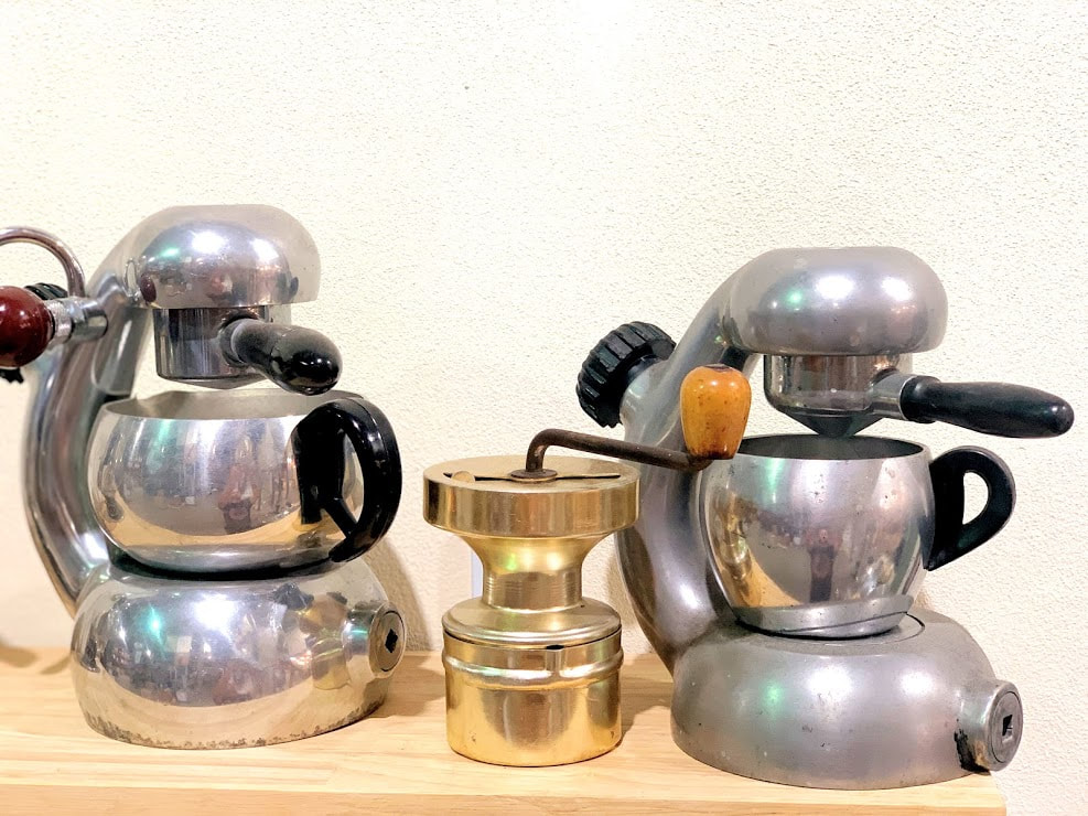 a pair of Atomic Espresso Makers